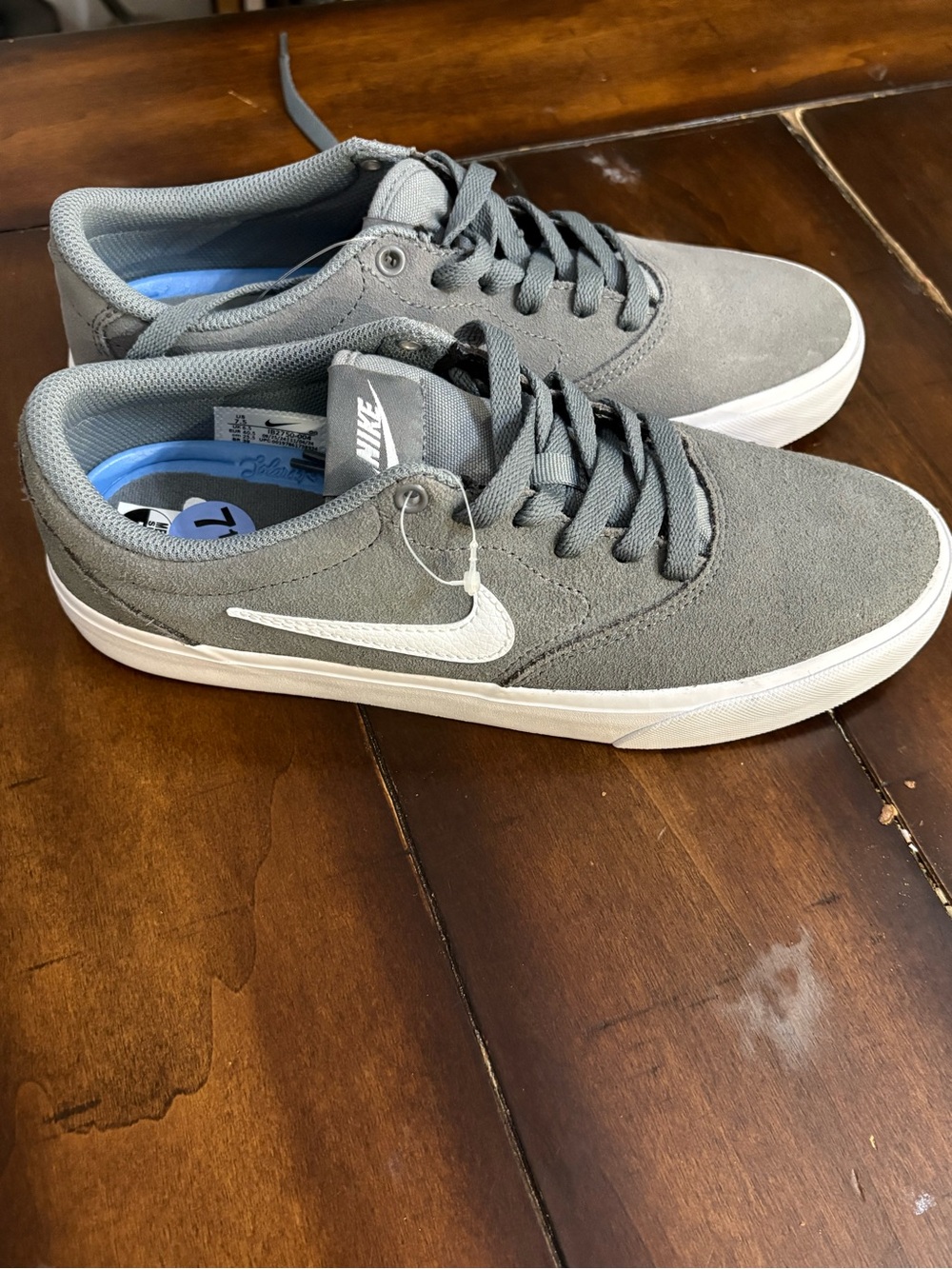 Nike Men’s Gray Suede Sneakers with White Swoosh